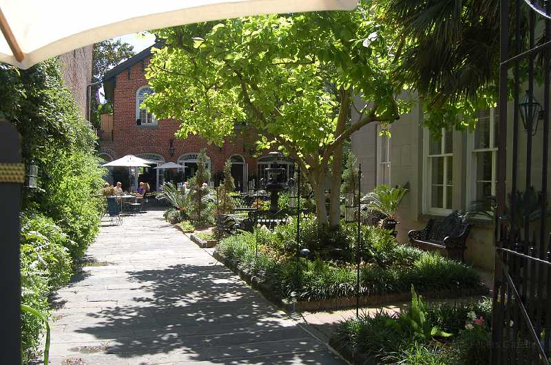 New Orleans 04-08-06 018.JPG - The courtyard at Two Sisters Restaurant.  It's an oasis in the midst of the French Quarter.